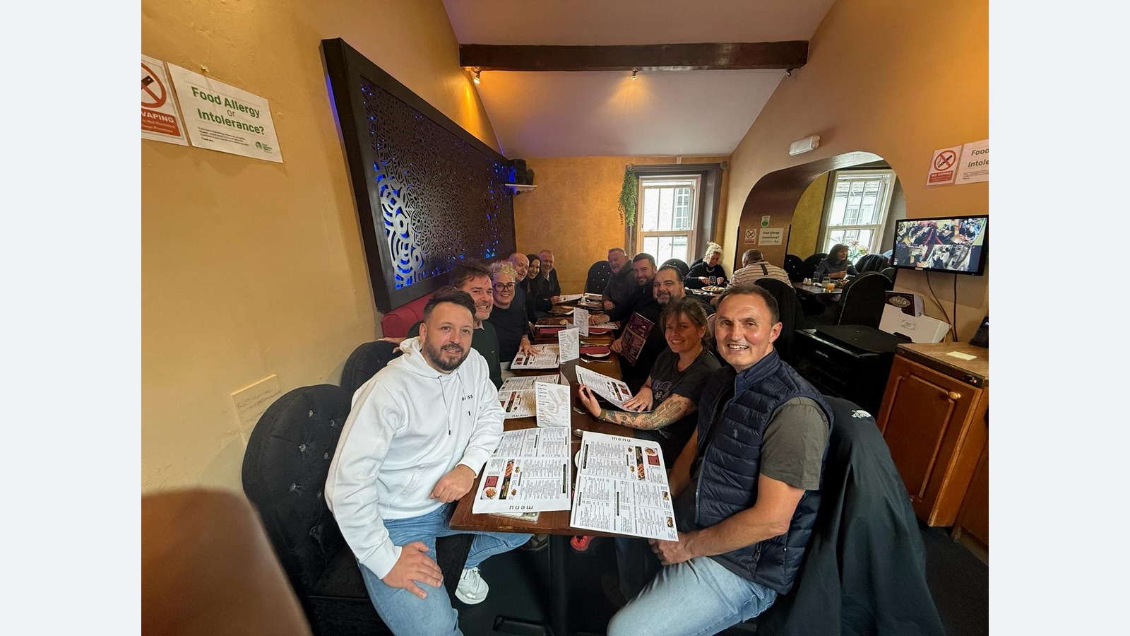 The GCH team sharing dinner together during the Lake District offsite