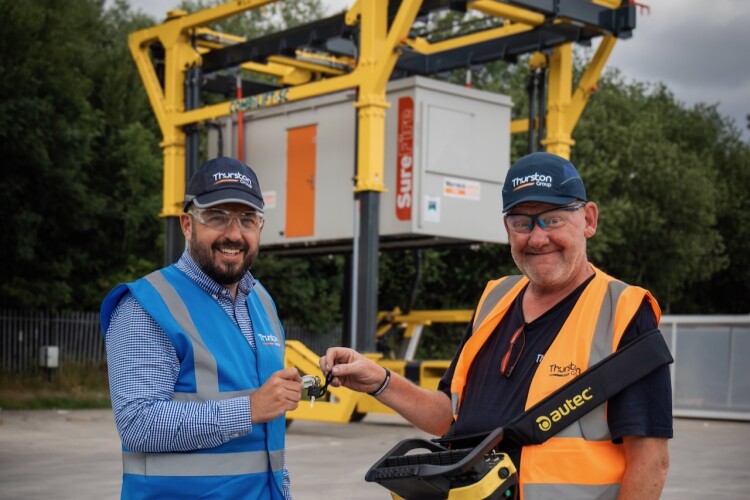 Thurston team members with the new Combilift equipment at the Wakefield site